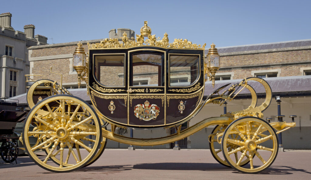 The Diamond Jubilee State Coach, featuring gold details.